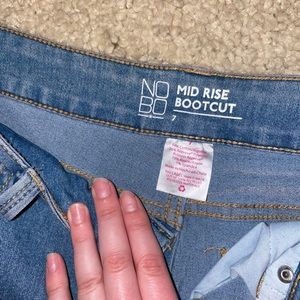 Brand new boot cut jeans, very flattering brand new